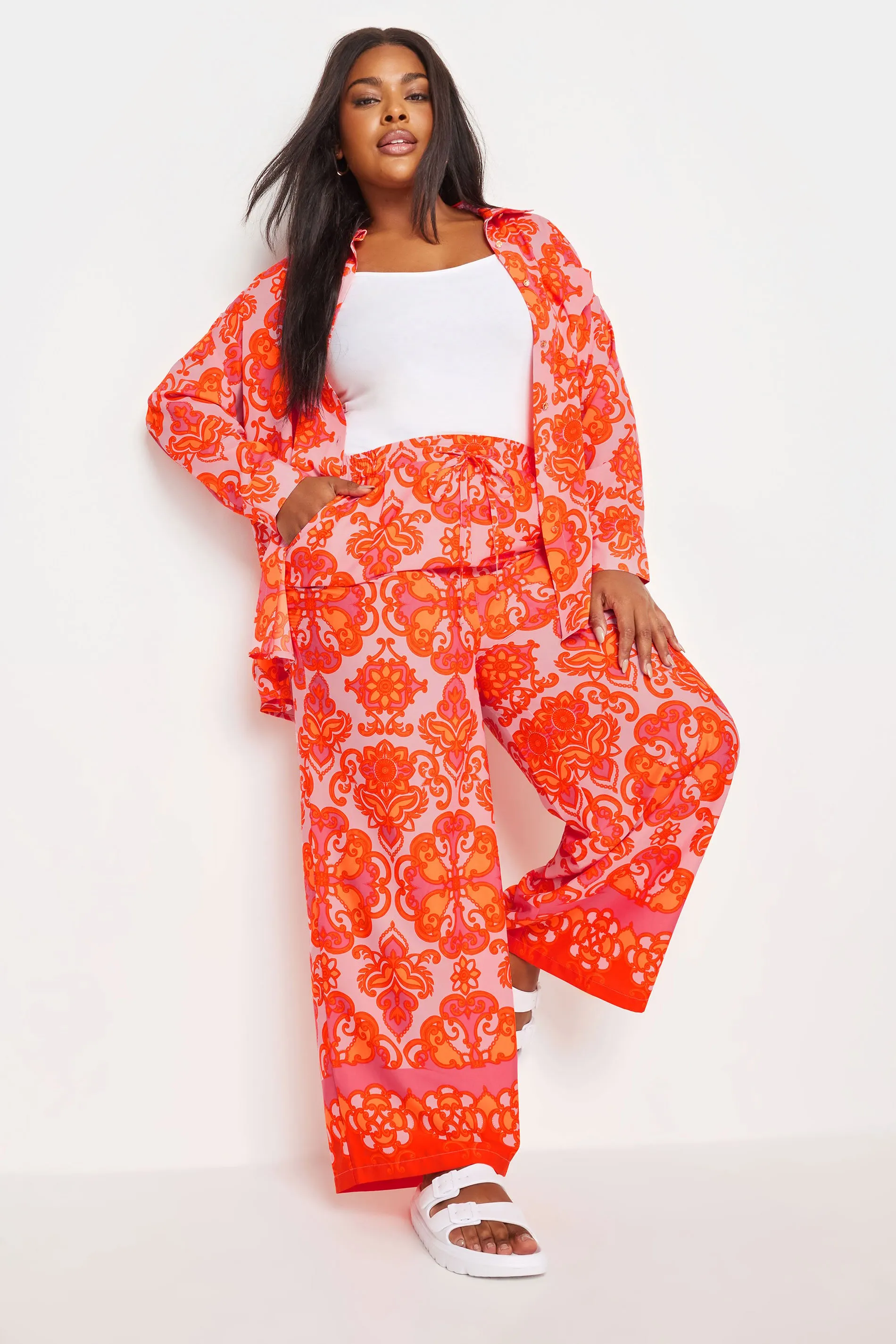 LIMITED COLLECTION Curve Orange Abstract Print Wide Leg Trousers