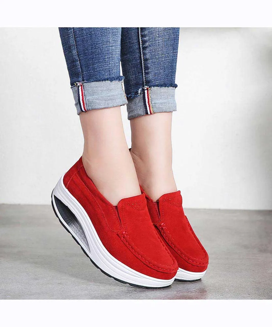 Red hollow slip on rocker bottom shoe sneaker